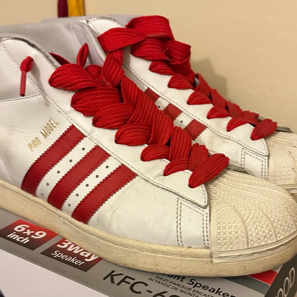 Adidas Pro Model high tops White and Red Athletic Shoes with Iconic Stripes